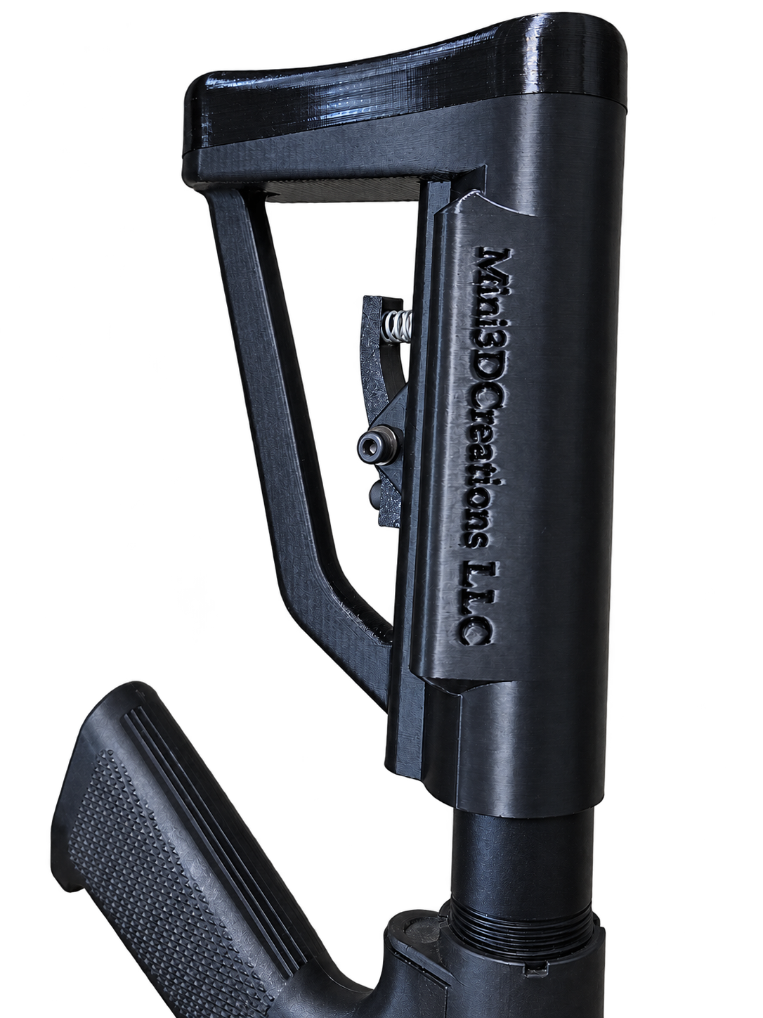 Printed mechanical prototype with spring-loaded trigger and hardware