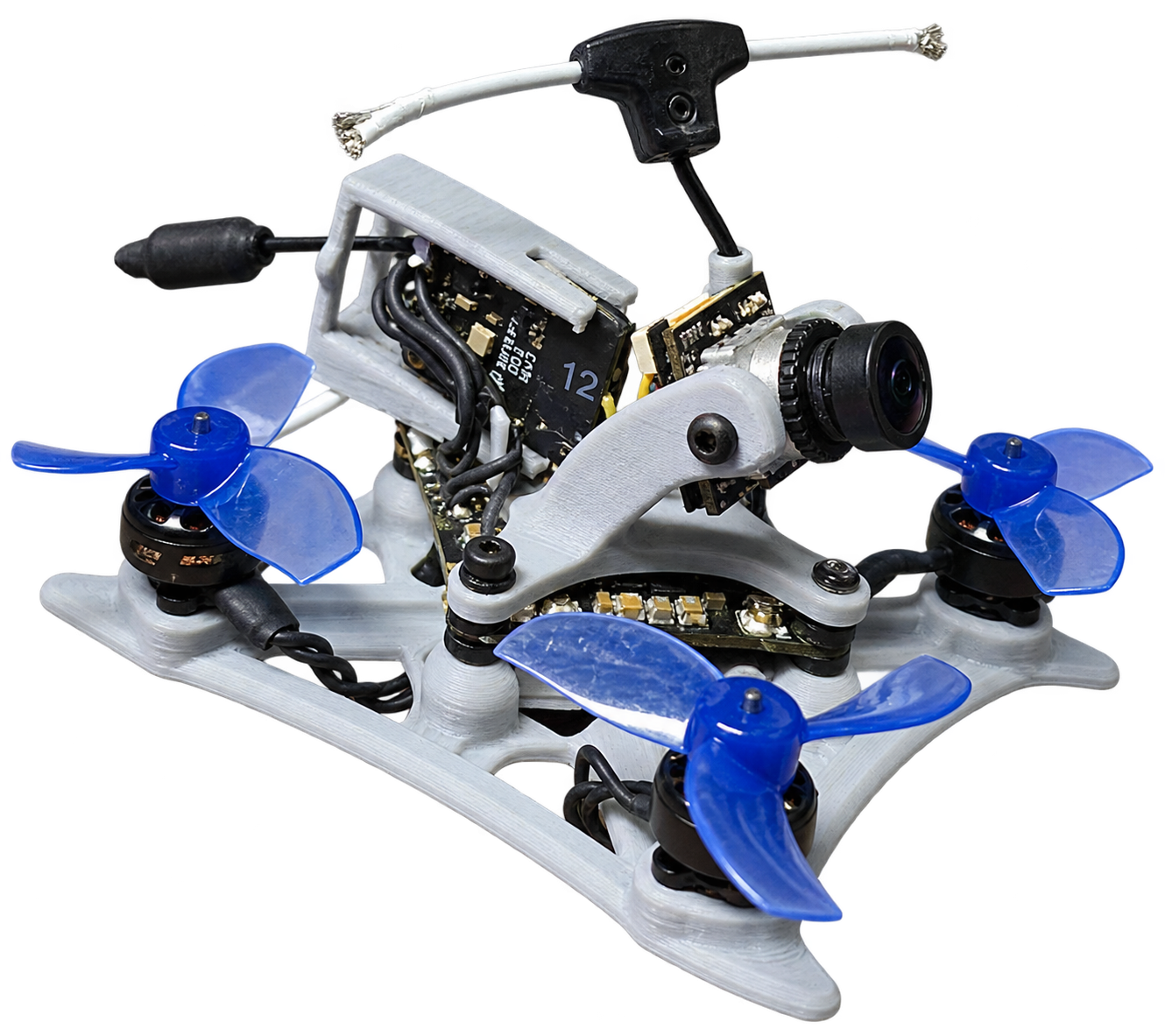 Compact FPV drone prototype with custom printed frame, camera, motors, and electronics